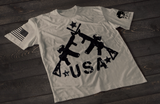 Gray USA rifle T-shirt featuring crossed rifle graphic forming a patriotic American flag style design with stars on the front