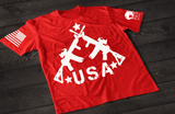Red USA rifle T-shirt featuring crossed rifle graphic forming a patriotic American flag style design with stars on the front